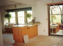 Reinstall the sink, installed a new faucett and even added a nice Corian breakfast shelf to the back of the new island